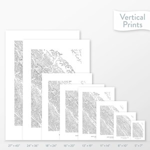 May include: A selection of vertical prints displaying detailed black and white topographical maps. Sizes vary from 13 cm x 18 cm to 69 cm x 102 cm. The prints feature intricate line work, with the text "Vertical Prints" in the upper right corner.
