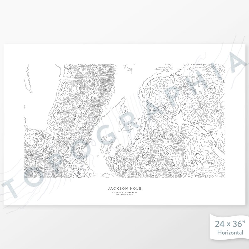 May include: A black and white topographic map print of Jackson Hole, Wyoming. The print shows the elevation contours of the area. The print is 24 inches by 36 inches and is horizontal.