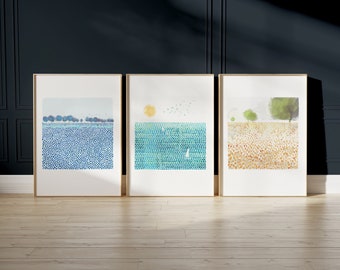 Set van 3 kunstprints, blauwe weideprint, zon- en zeeprint, oranje tulpenweideprint