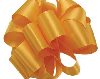 May include: A large, bright yellow satin ribbon bow. The bow is tied in a classic, symmetrical shape with multiple loops and tails.