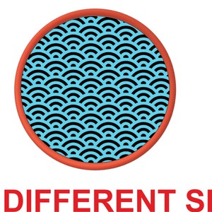 May include: A red circle with a blue and black pattern of overlapping semicircles. The text "23 DIFFERENT SIZE" is below the circle.