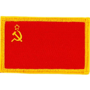 May include: A rectangular patch depicting the flag of the Soviet Union. The patch has a red background with a gold hammer and sickle emblem in the upper left corner. The border is yellow.
