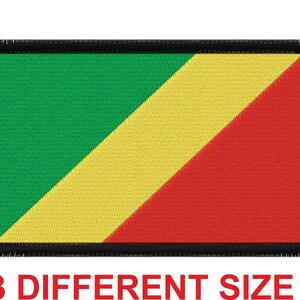 May include: A rectangular fabric patch with the flag of the Republic of the Congo. The flag is green, yellow, and red, with a diagonal yellow stripe dividing the green and red sections. The patch has a black border with a frayed edge.
