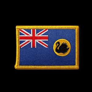 May include: Embroidered patch depicting the flag of Western Australia. The design features the Union Jack, a blue background, and a black swan emblem on a yellow circle. The patch is framed with a gold border.