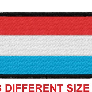 May include: A rectangular embroidered patch with the flag of Luxembourg. The flag is red, white, and light blue with a black border.