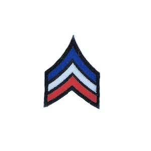 May include: A blue, white, and red chevron patch with three stripes. The patch is embroidered and has a black outline.