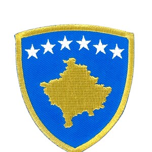 May include: A blue and gold embroidered patch featuring the outline of Kosovo with six white stars above it.