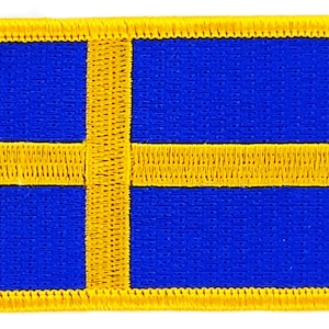 Puede incluir: Un parche bordado con la bandera de Suecia. La bandera tiene una cruz amarilla sobre un fondo azul.