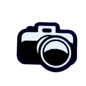 Patch de broderie coudre le fer d’insigne sur l’image photo de caméra de transfert de colle