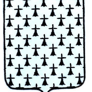 May include: A heraldic shield with a white background, densely covered with black ermine spots. The shield has a pointed base and a black border, showcasing a classic coat of arms design.