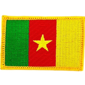 May include: A yellow, red, and green embroidered patch with a yellow star in the center. The patch has a yellow border.