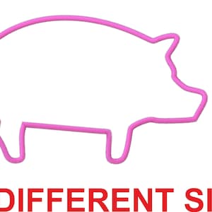 May include: Outline of a pink pig, 7 different sizes.