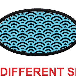 May include: Black and light blue oval patch with a repeating pattern of overlapping semicircles.