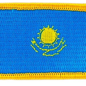 May include: A blue embroidered patch with a yellow border. The patch features a yellow sun with a green stylized eagle design.