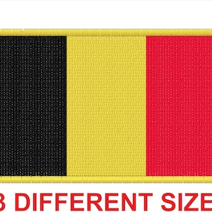 May include: A black, yellow, and red embroidered patch with a yellow border. The patch features the colors of the Belgian flag.