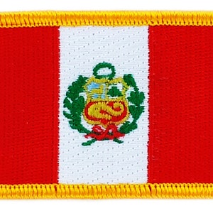 May include: A red, white, and red Peruvian flag patch with a yellow border and the national coat of arms in the center.