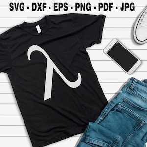 May include: A black t-shirt with a white lambda symbol on the front. The t-shirt is laid out on a white wooden surface with a pair of blue jeans and a white smartphone.