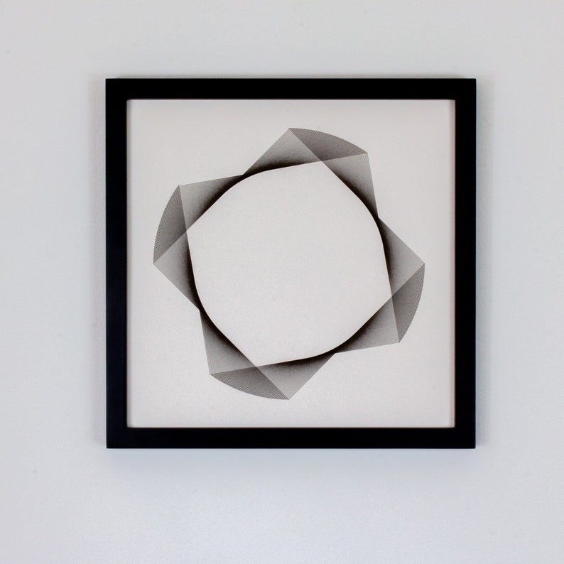May include: A black framed artwork featuring a geometric design of overlapping gray shapes forming a circle in the center.