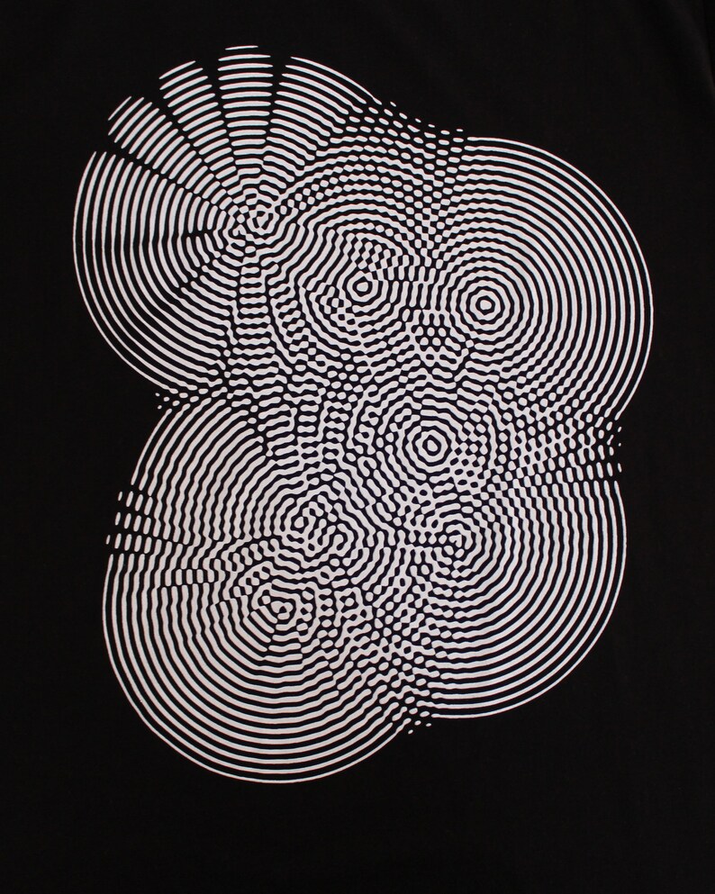 May include: A black and white abstract design with concentric circles and wavy lines.