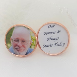 May include: Two round, gold-rimmed, glass photo charms. One charm features a photo of a man with a white beard and glasses. The other charm has the text "Our Forever & Always Starts Today".