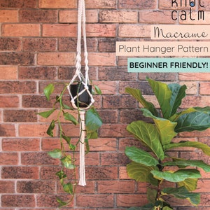 May include: A white macrame plant hanger with a black pot and green plant hanging from a brick wall. The text "knot calm" and "Macrame Plant Hanger Pattern" is displayed above the hanger. The text "BEGINNER FRIENDLY!" is displayed below the hanger.