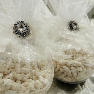 Sofreh Aghd Two Nogl Ball Decorated with Feather and Antique Brooch for Persian Wedding Spread