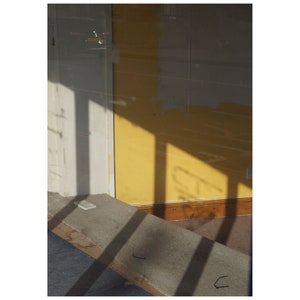 yellow vacant building interior abstract minimal light and shadow photography print