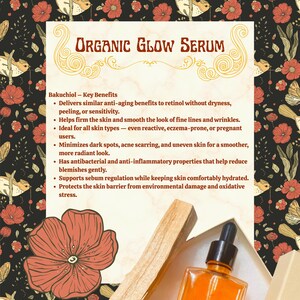 May include: An orange Organic Glow Serum bottle with a dropper is displayed in a white box, next to a wooden stick and a large red flower. The background features a floral pattern with birds and butterflies. The text on the image lists the serum's key benefits.
