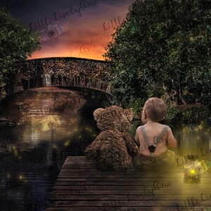 May include: A young child sits on a wooden dock with a brown teddy bear. The dock is over a pond with a stone bridge in the background. The scene is lit by fireflies and the sky is a soft orange and purple.