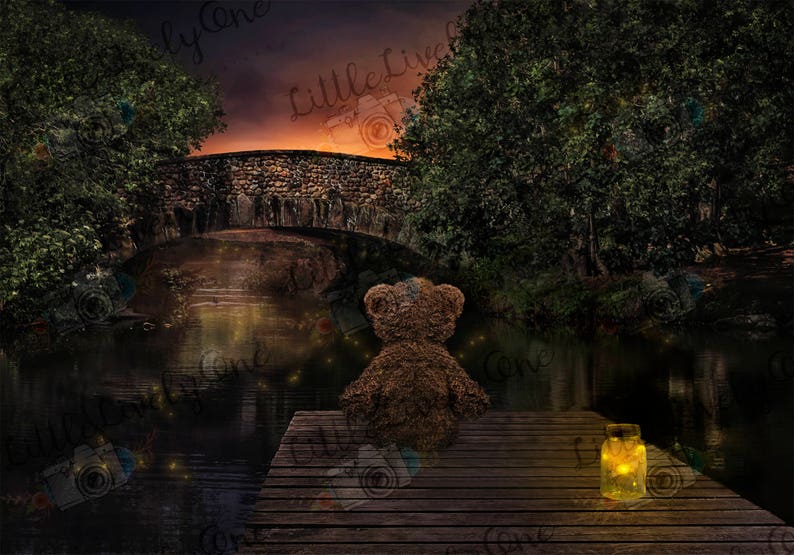 May include: A brown teddy bear sits on a wooden dock overlooking a dark, still pond. The pond is surrounded by trees and a stone bridge. A small jar with a glowing light sits on the dock next to the bear.