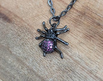 Spider Necklace. Gunmetal spider necklace with purple and black rhinestones
