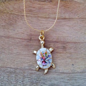 Turtle Necklace, Gold sea turtle with multicolored flower design, cute dainty necklace, gift for her, 18" long