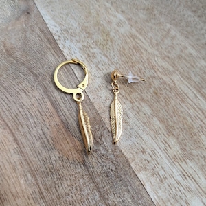 Gold feather earring mens store