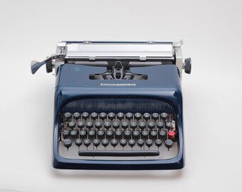 Olivetti Studio 44 marineblauwe vintage typemachine, onderhouden
