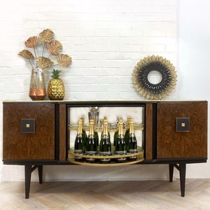 Mid Century Beautility Cocktail Sideboard - revolving cabinet.