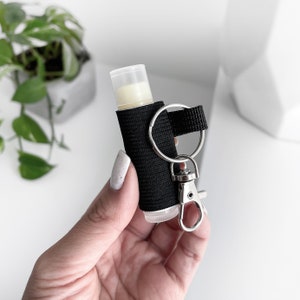 Designer leather lipstick holder keychain with lip gloss