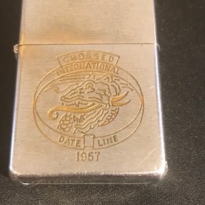 Crossed International Date Line Zippo Full Size Lighter Used (dated 1957) Domain of the Golden Dragon