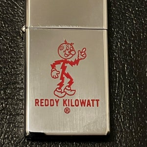 ZIPPO Reddy Kilowatt 1999年製 s-l400.jpg