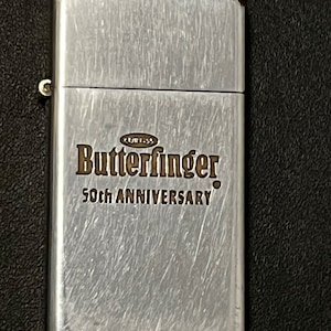 Butterfinger Candy Bar 50th Anniversary Zippo Slim Advertising Lighter - 1973 Used
