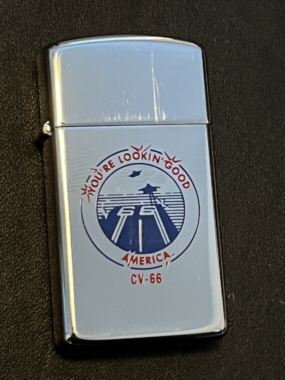 USS America Aircraft Carrier CV-66 'Lookin' Good' Zippo Slim Lighter - 1981 USS America Aircraft Carrier CV-66 'Lookin' Good' Zippo Slim Lighter - 1981