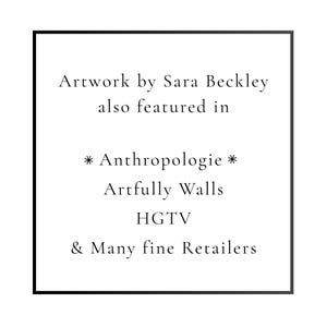 May include: A black-bordered square with white text. The text reads "Artwork by Sara Beckley also featured in * Anthropologie * Artfully Walls HGTV & Many fine Retailers."