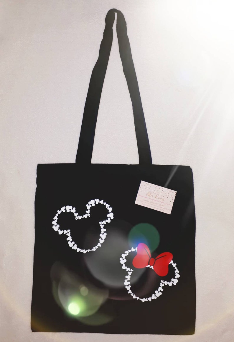 Tote bag adorned with a couple of famous mouse in cartoon-delivery available Slocrea