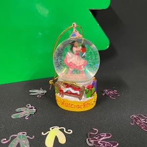 A Mini Black Clara Snow Globe