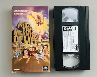 Monty Python's The Meaning of Life, 1983 Graham Chapman, John Cleese vintage VHS tape movie classic comedy home video