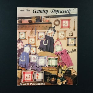 Love That Country Hopscotch pattern book, Burdett Publications 1984 designs ideas diy counted cross stitch
