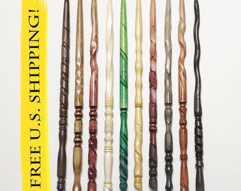 May include: A collection of eleven handcrafted wooden wands in various colors and designs. Each wand has a unique shape, with spiral, twisted, and smooth textures. The wands are numbered 11-20. A yellow banner with the text "FREE U.S. SHIPPING!" is on the left.
