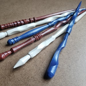 Each is one-of-a-kind, so grab that one that caught your eye before someone else does! We try to post new wands weekly, so if your favorite is sold out, there will be all new designs ready next week!