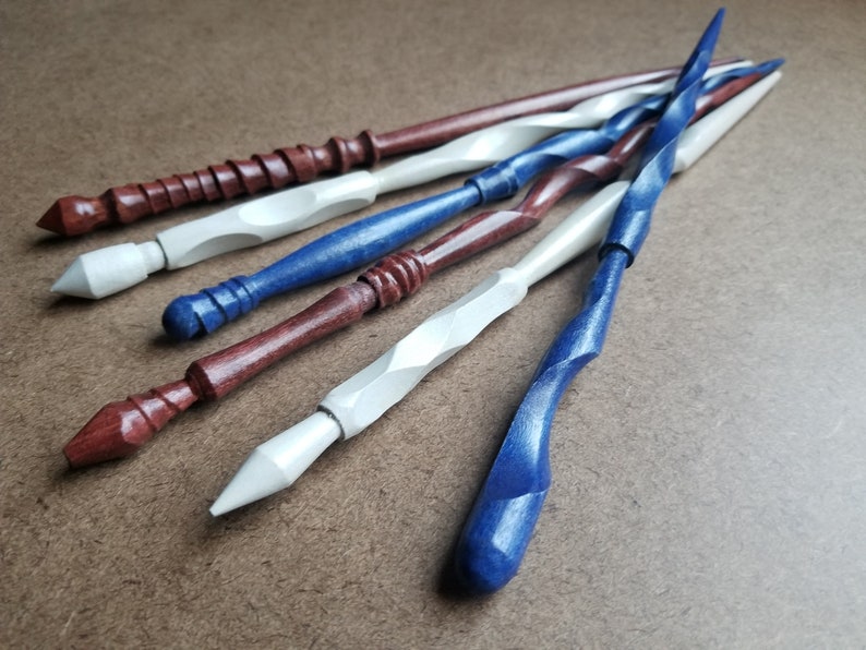 Each is one-of-a-kind, so grab that one that caught your eye before someone else does! We try to post new wands weekly, so if your favorite is sold out, there will be all new designs ready next week!