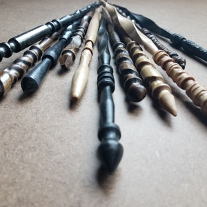 Each is one-of-a-kind, so grab that one that caught your eye before someone else does! We try to post new wands weekly, so if your favorite is sold out, there will be all new designs ready next week!