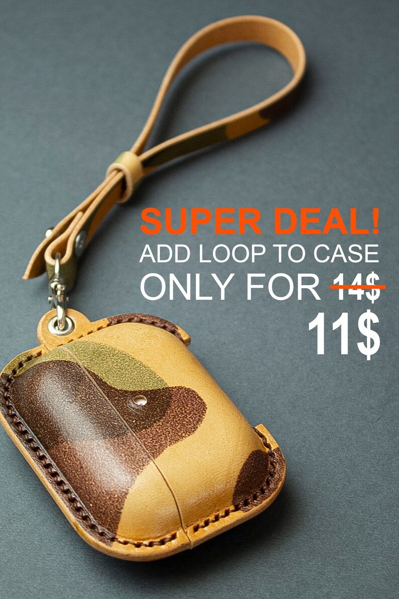 May include: A camouflage patterned leather case with a matching leather wrist loop attached by a metal swivel clasp. The case features visible stitching along the edges. Text on the image reads: SUPER DEAL! ADD LOOP TO CASE ONLY FOR 14$ 11$.